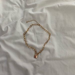 Gold lock necklace